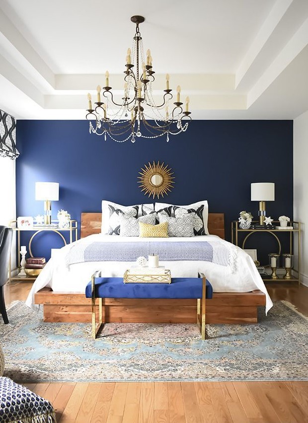 Indigo color wall in a beautiful bedroom.